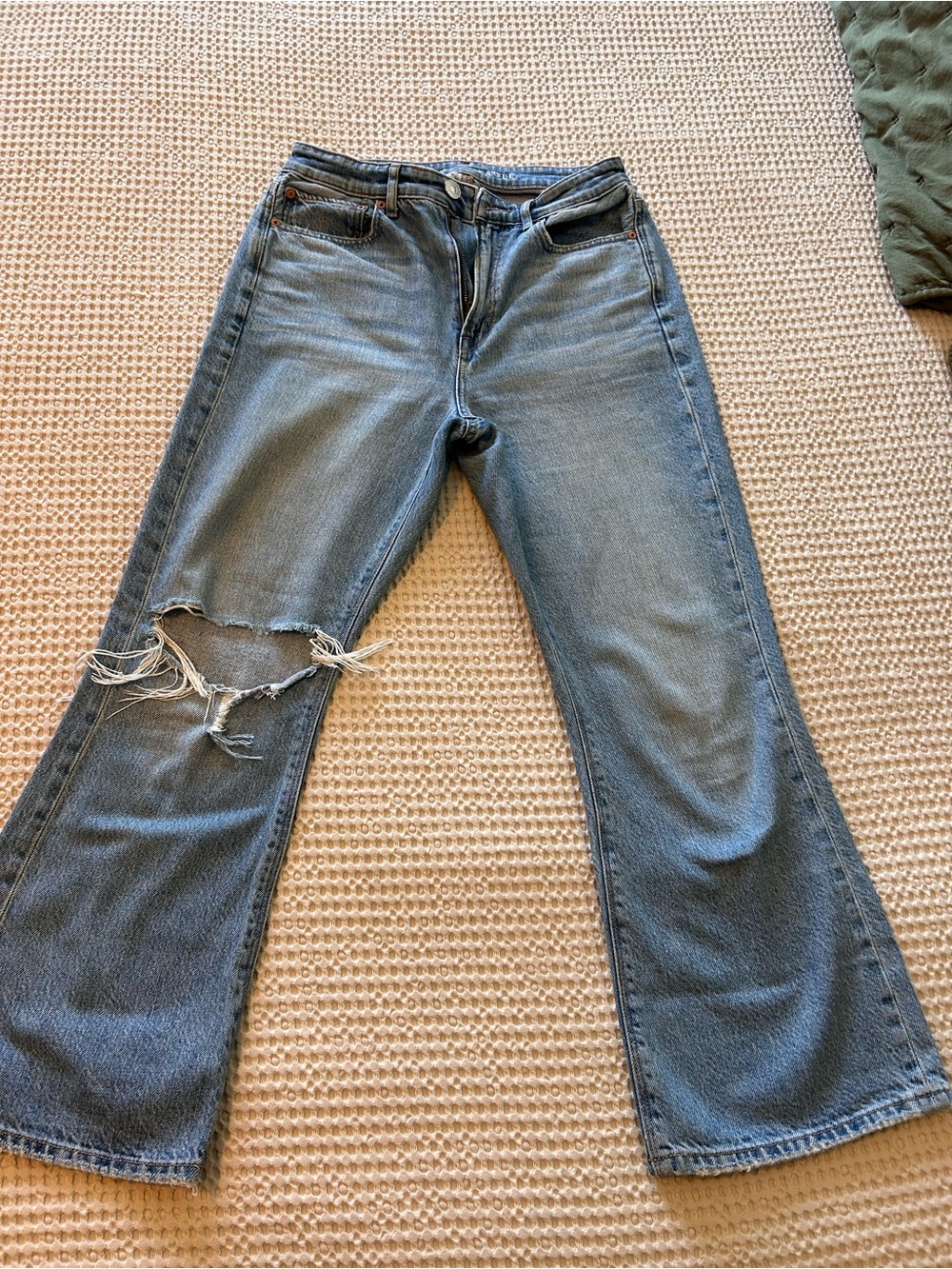 American Eagle Outfitters Faded Blue Flare Jeans with Knee Distress